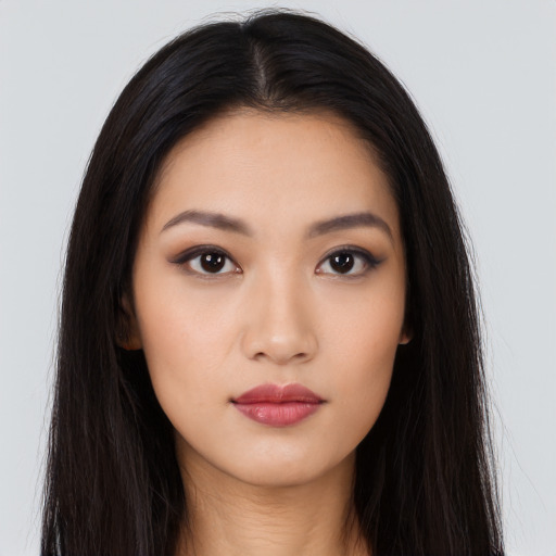 Neutral asian young-adult female with long  black hair and brown eyes