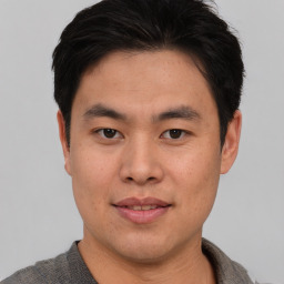 Neutral asian young-adult male with short  brown hair and brown eyes