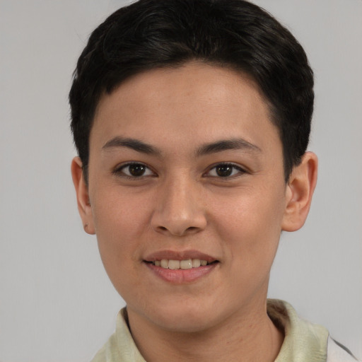 Joyful white young-adult female with short  black hair and brown eyes