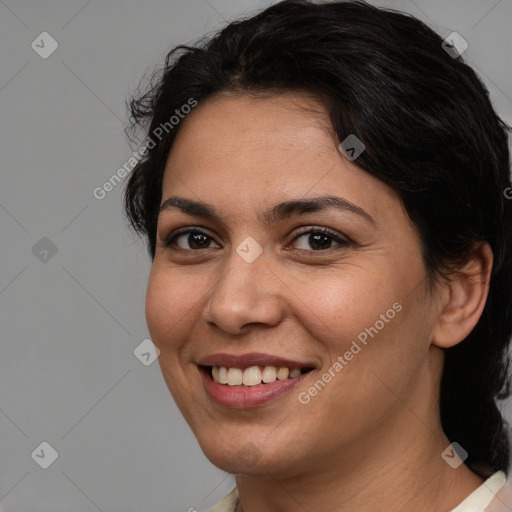 Joyful white adult female with short  brown hair and brown eyes