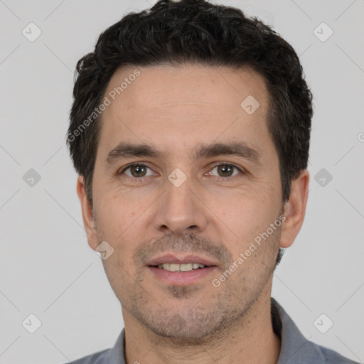 Neutral white adult male with short  black hair and brown eyes