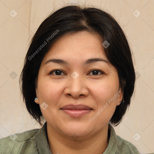 Joyful white adult female with medium  brown hair and brown eyes