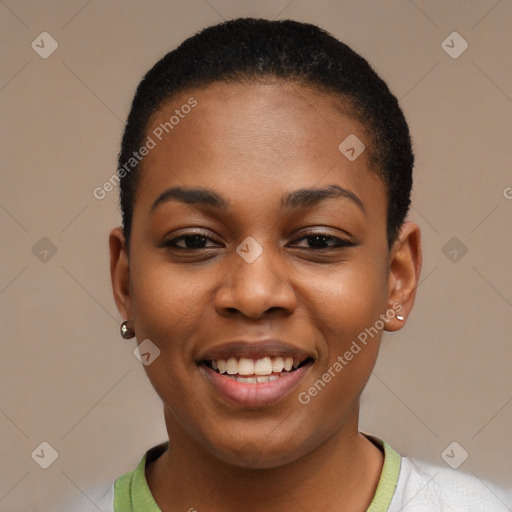 Joyful black young-adult female with short  black hair and brown eyes