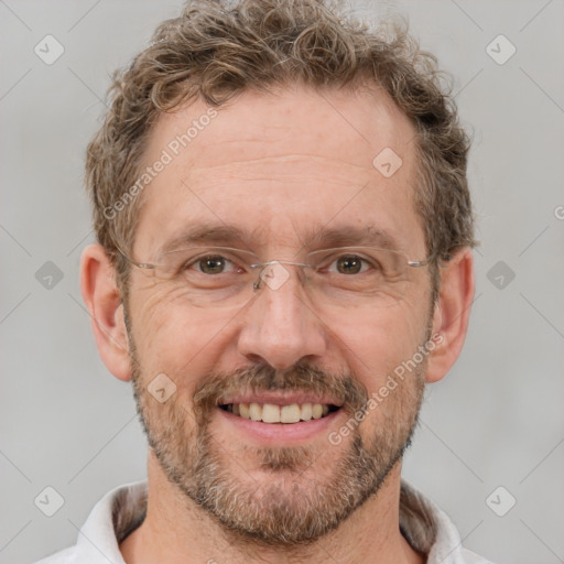 Joyful white adult male with short  brown hair and grey eyes