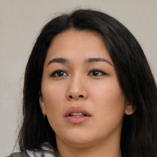 Neutral asian young-adult female with long  black hair and brown eyes