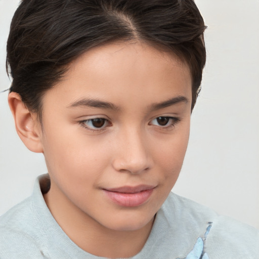 Joyful white child female with short  brown hair and brown eyes