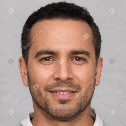 Joyful white young-adult male with short  brown hair and brown eyes