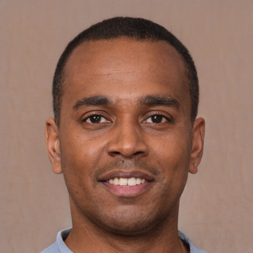 Neutral latino young-adult male with short  brown hair and brown eyes