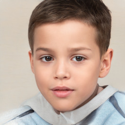 Joyful white child male with short  brown hair and brown eyes