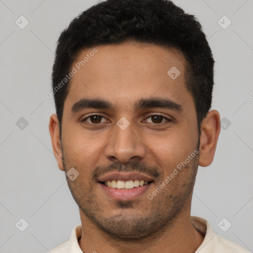 Joyful latino young-adult male with short  black hair and brown eyes