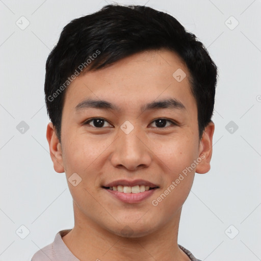 Joyful asian young-adult male with short  black hair and brown eyes