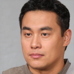Neutral asian young-adult male with short  black hair and brown eyes