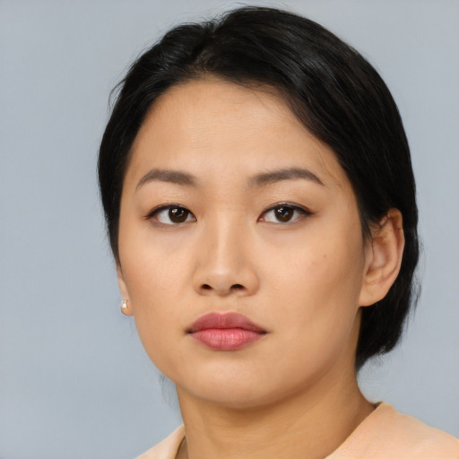 Neutral asian young-adult female with medium  black hair and brown eyes