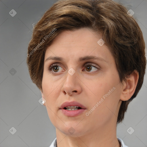 Joyful white adult female with medium  brown hair and brown eyes