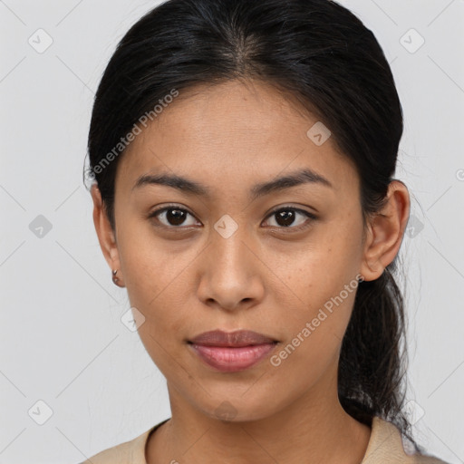 Joyful asian young-adult female with medium  brown hair and brown eyes