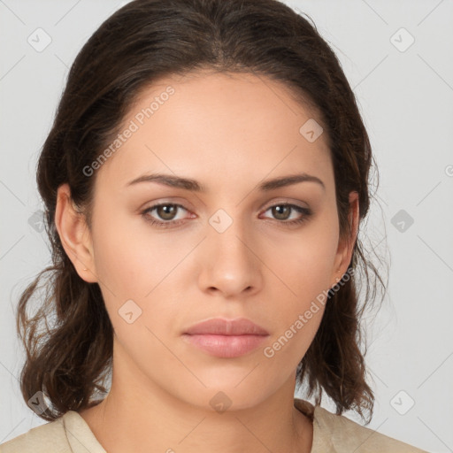 Neutral white young-adult female with medium  brown hair and brown eyes