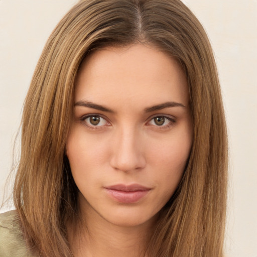 Neutral white young-adult female with long  brown hair and brown eyes