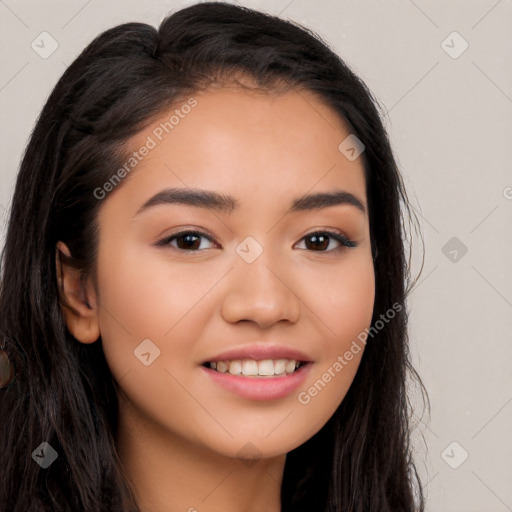 Joyful latino young-adult female with long  black hair and brown eyes