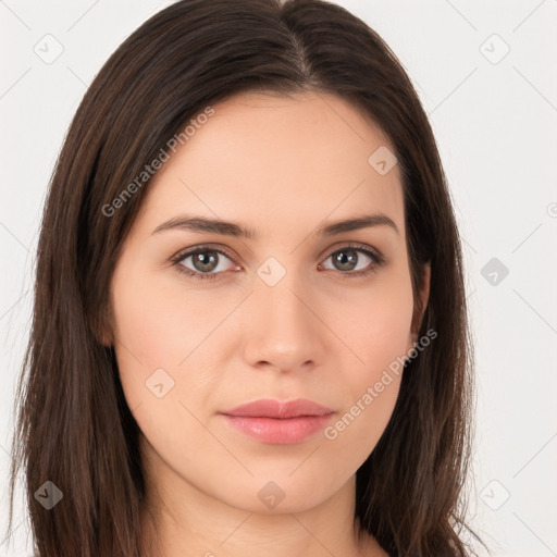 Neutral white young-adult female with long  brown hair and brown eyes