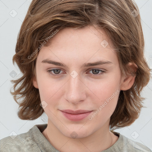 Joyful white young-adult female with medium  brown hair and blue eyes