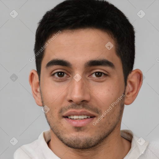 Joyful white young-adult male with short  black hair and brown eyes