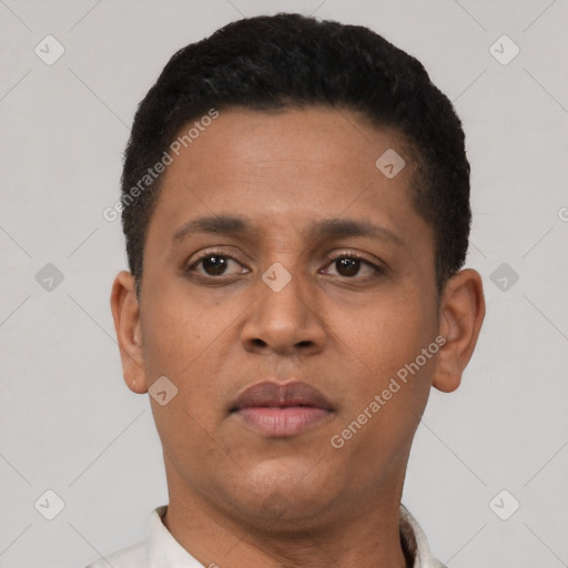 Neutral latino young-adult male with short  brown hair and brown eyes