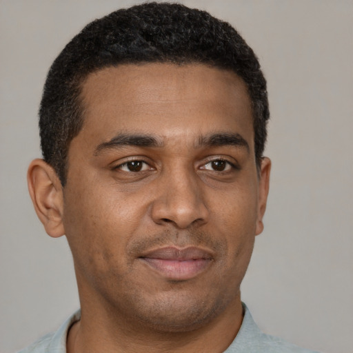 Neutral black young-adult male with short  brown hair and brown eyes