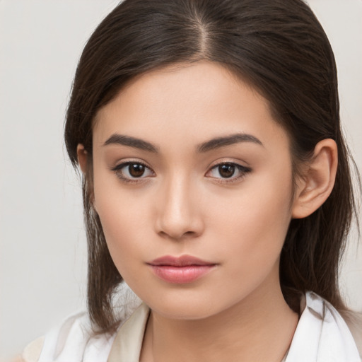 Neutral white young-adult female with long  brown hair and brown eyes