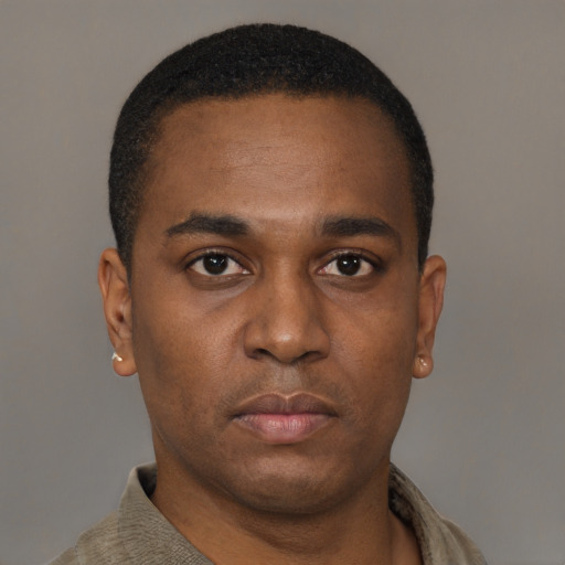 Neutral black young-adult male with short  brown hair and brown eyes
