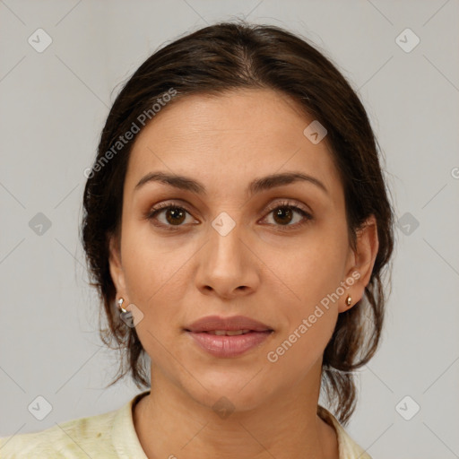 Joyful white young-adult female with medium  brown hair and brown eyes