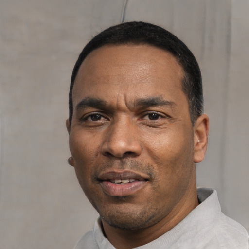Neutral white adult male with short  black hair and brown eyes