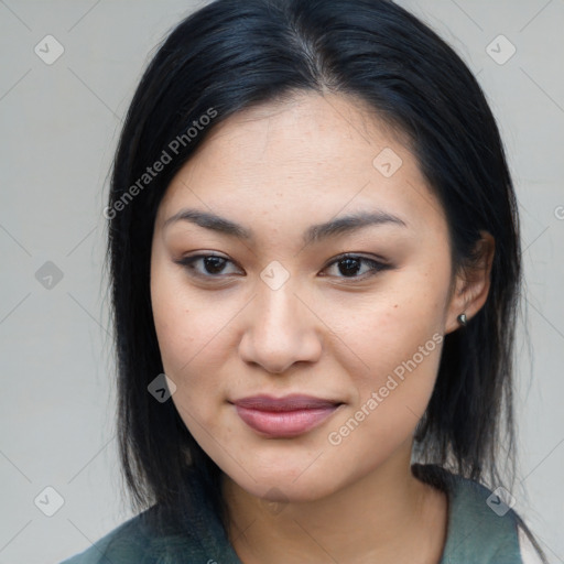 Joyful latino young-adult female with medium  black hair and brown eyes