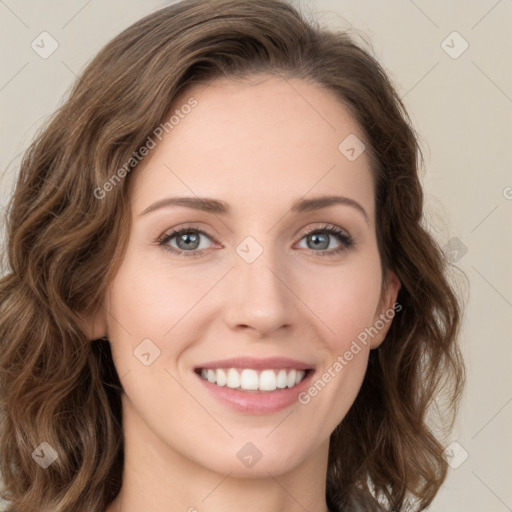 Joyful white young-adult female with medium  brown hair and green eyes