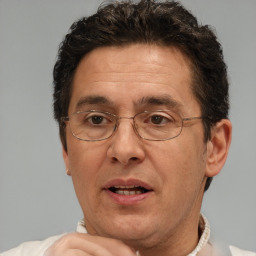 Joyful white middle-aged male with short  brown hair and brown eyes