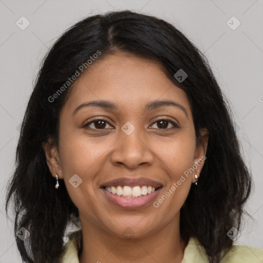 Joyful latino young-adult female with long  brown hair and brown eyes