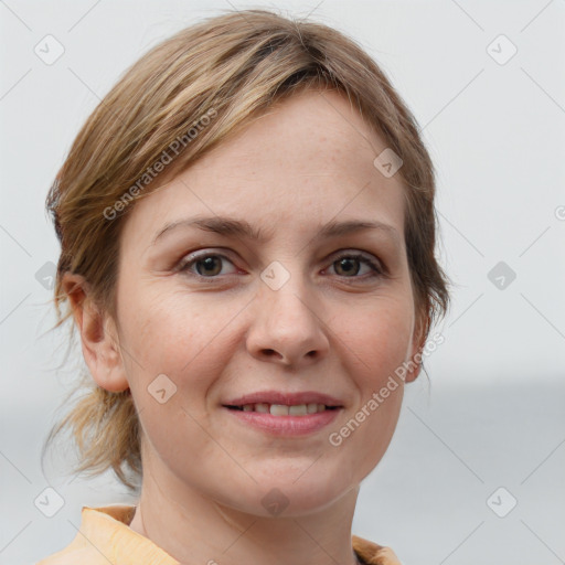 Joyful white young-adult female with medium  brown hair and grey eyes