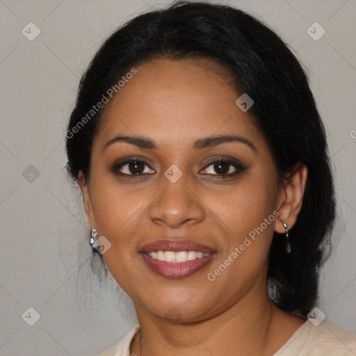 Joyful black young-adult female with medium  black hair and brown eyes