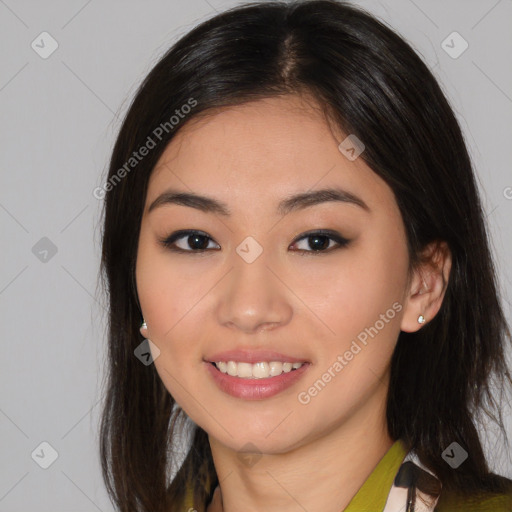 Joyful asian young-adult female with medium  brown hair and brown eyes