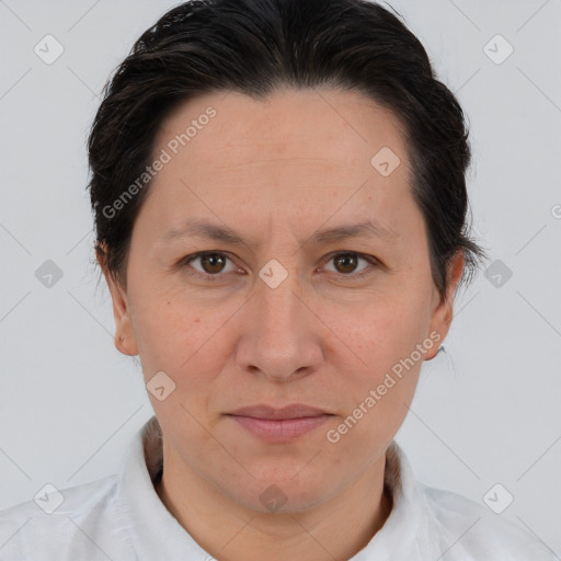 Joyful white adult female with short  brown hair and brown eyes