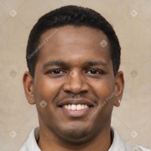 Joyful latino young-adult male with short  brown hair and brown eyes