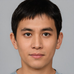 Neutral asian young-adult male with short  brown hair and brown eyes