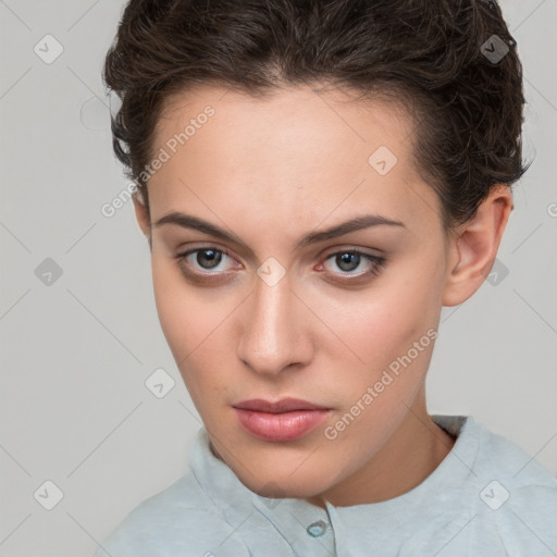 Neutral white young-adult female with short  brown hair and brown eyes