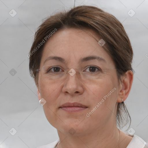 Joyful white adult female with short  brown hair and brown eyes