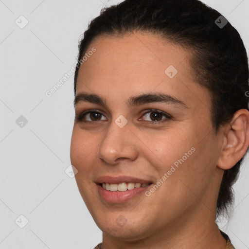 Joyful white young-adult female with short  brown hair and brown eyes