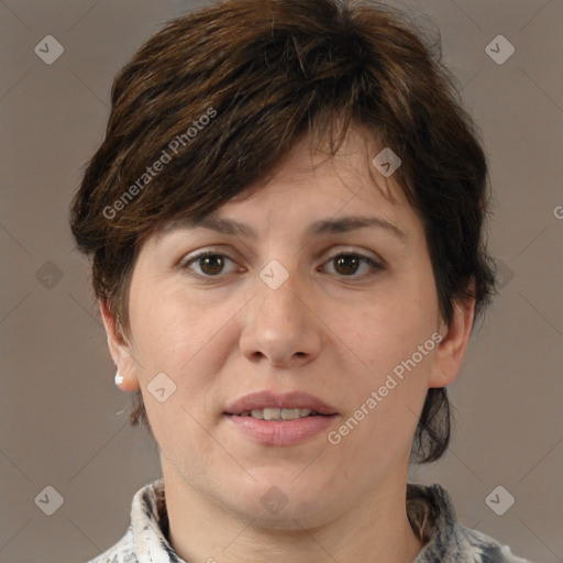 Joyful white adult female with medium  brown hair and brown eyes