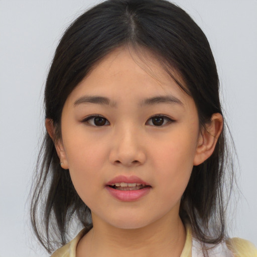 Neutral asian child female with medium  brown hair and brown eyes