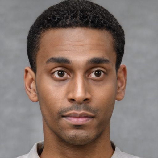 Neutral black young-adult male with short  black hair and brown eyes