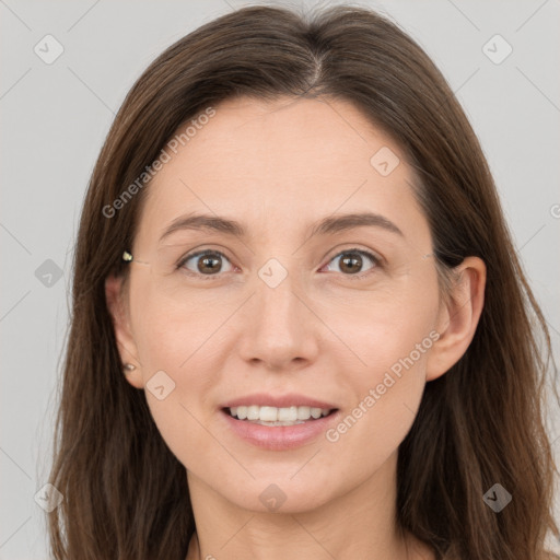 Joyful white young-adult female with long  brown hair and grey eyes