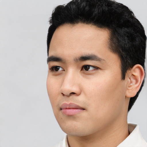 Neutral asian young-adult male with short  black hair and brown eyes