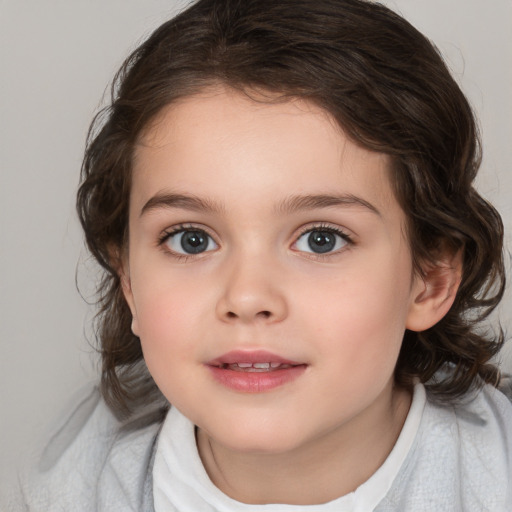 Joyful white child female with medium  brown hair and brown eyes